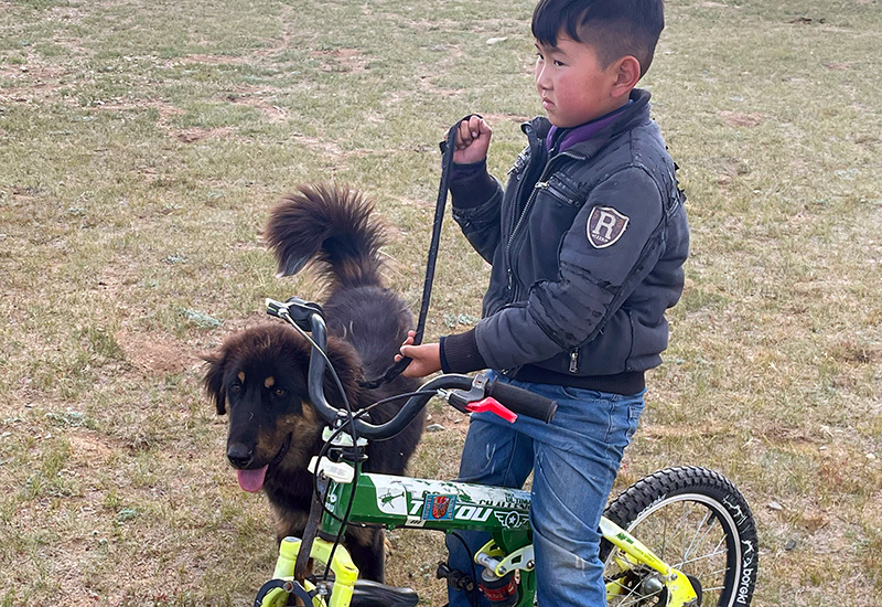 Young cyclist with his friend